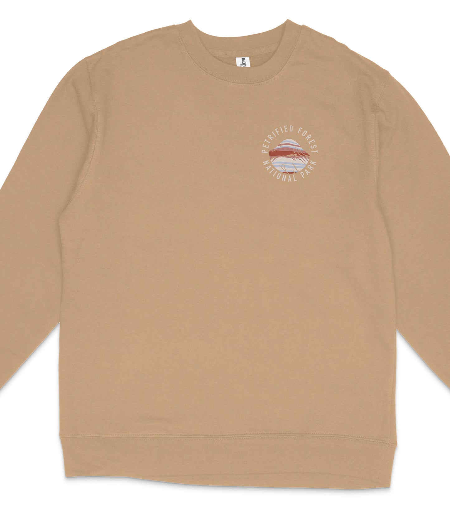 A beige long-sleeved shirt with a round logo on the left side.