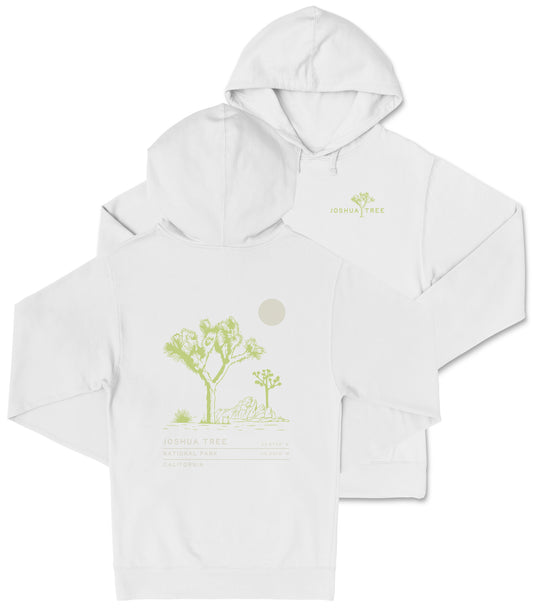 A white hooded sweatshirt with a graphic design depicting a desert landscape with a tree and a moon.